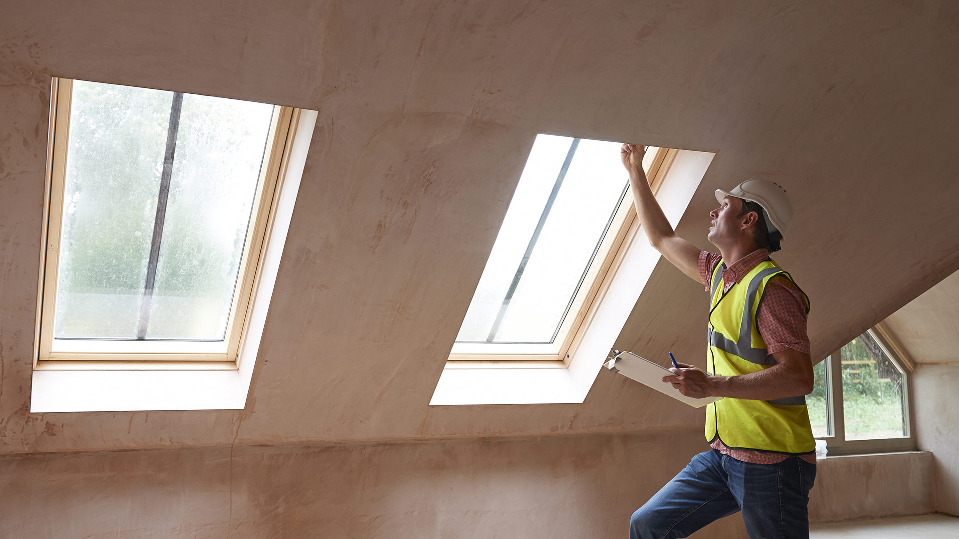 inspector looking at skylight windows sarasota fl